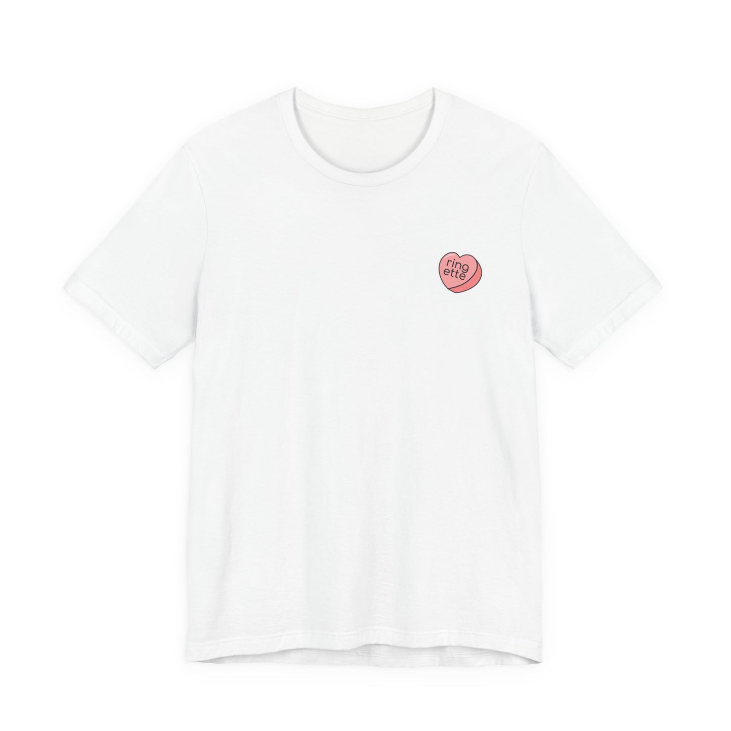 White t-shirt with a small pink heart-shaped logo and 'ringette' text on a white background