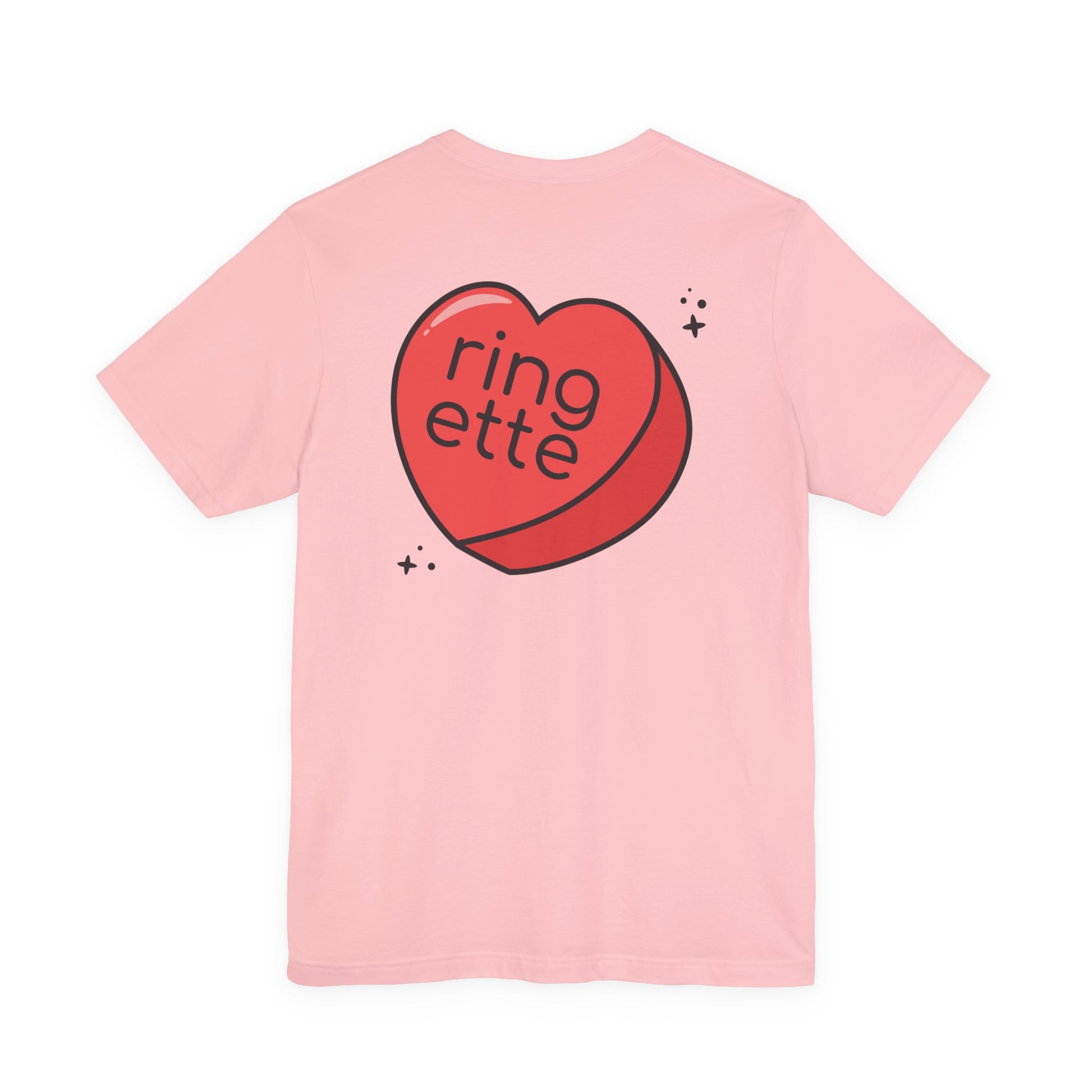 Pink t-shirt with a large red heart-shaped logo and 'ringette' text on a white background
